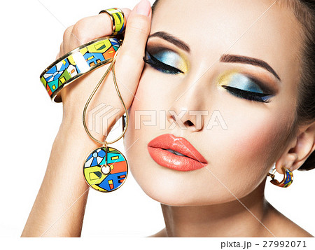Beautiful woman with creative bright makeup. Beautiful woman with creative bright makeup. 27992071