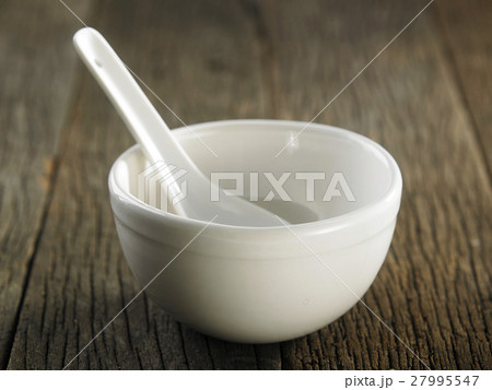bowl with spoon bowl with spoon 27995547