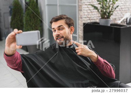 写真素材: Male client boasting of his hairstyle