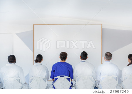 Smart medical team analyzing symptoms 27997249