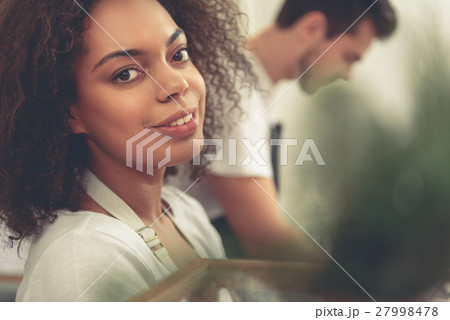 Pretty barista enjoying her work Pretty barista enjoying her work 27998478