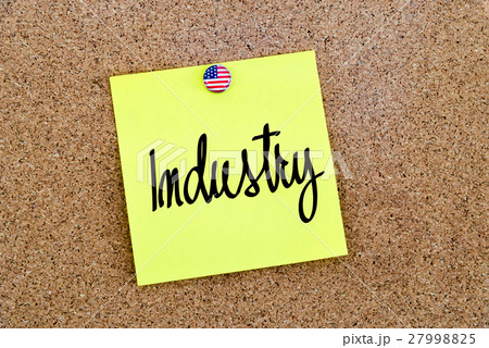 Written text Industry over yellow paper note 27998825