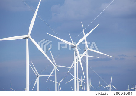 Close up of wind turbines in blue sky Close up of wind turbines in blue sky 28001084
