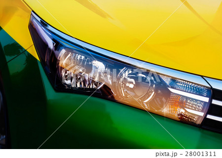 colorful headlights of city car 28001311