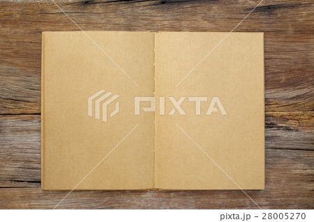 Notebook  on wooden table 28005270
