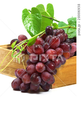 Red grape in wood box on white background. 28006938