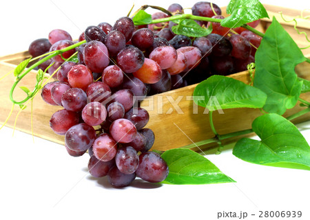Red grape in wood box on white background. 28006939