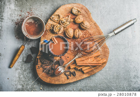 Rich hot chocolate with cinnamon and walnuts, top Rich hot chocolate with cinnamon and walnuts, top 28010878