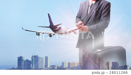 man in airport with luggage 28011266