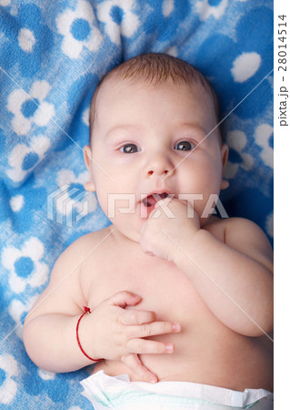 cute little boy on blue background 28014514