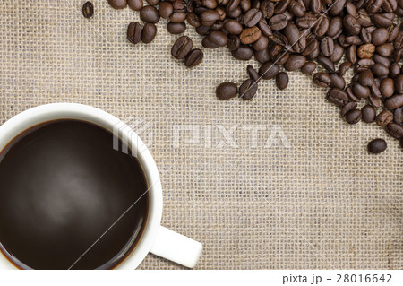 cup of coffee on a burlap sack cup of coffee on a burlap sack 28016642