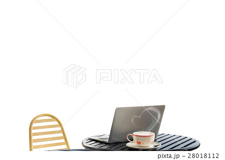 Laptop and coffee cup on desk in flowers garden 28018112