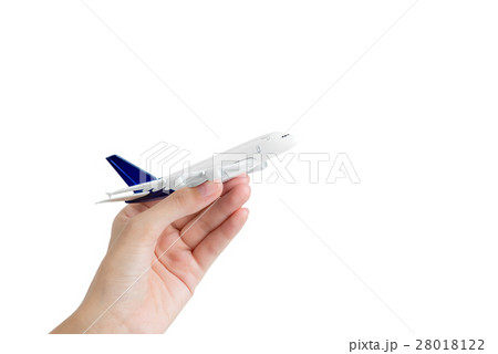 Woman hand holding model airplane 28018122