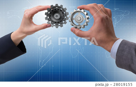 Businessman in teamwork concept with cogwheels Businessman in teamwork concept with cogwheels 28019155
