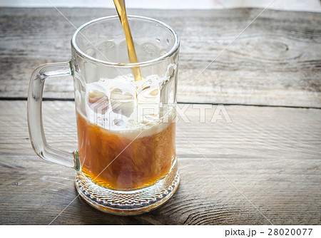 Beer pouring into mug Beer pouring into mug 28020077