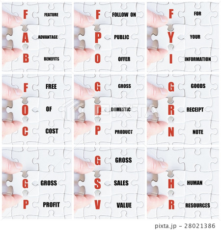 Hand of business man completing the puzzle 28021386