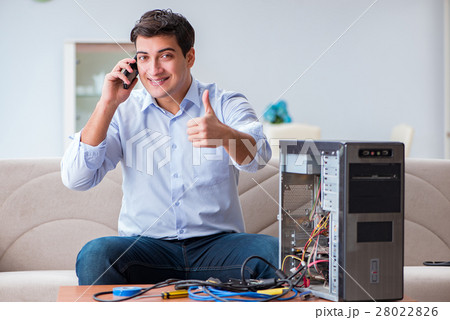 Happy customer resolving his computer problem 28022826