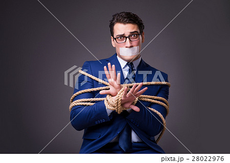 Businessman Taken Hostage And Tied Up With Ropeの写真素材 [28022976] - PIXTA