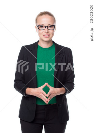 Business woman standing with arms crossed against 28023026