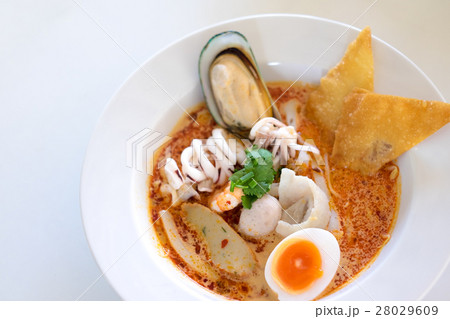Tom Yum sea food noodle on white table 28029609