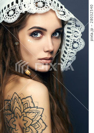 Beautiful Girl with tattoo,dreadlocks and lace Beautiful Girl with tattoo,dreadlocks and lace 28032540