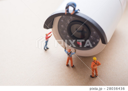 Workers doing maintenance security camera. Workers doing maintenance security camera. 28036436