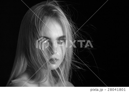 sad blond woman 28041801