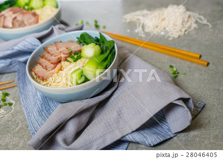 delicious egg noodle with red pork and vegetable 28046405