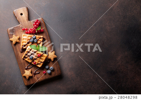 Waffles, candies and sweets 28048298