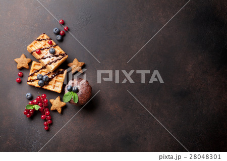 Waffles, candies and sweets 28048301