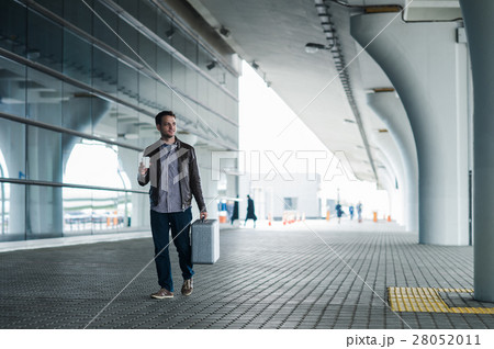 Portrait casual young man leaning against the 28052011