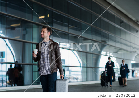 Portrait casual young man standing in the doorway Portrait casual young man standing in the doorway 28052012