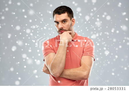 man thinking over snow background man thinking over snow background 28053331