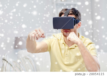 young man in virtual reality headset or 3d glasses young man in virtual reality headset or 3d glasses 28054115