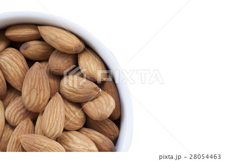 Almonds on a white background. Almonds on a white background. 28054463