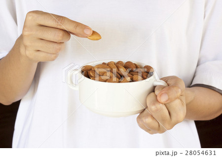 Almonds on a white background. 28054631