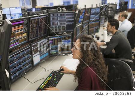 Young traders analyzing computer data 28055263