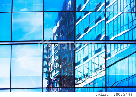 USA, New York, Clouds and residential building reflecting in glassy office building USA, New York, Clouds and residential building reflecting in glassy office building 28055443