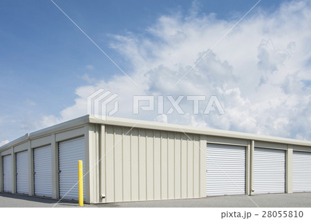 Blue sky over distribution warehouse 28055810