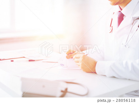 male doctor writing prescription paper 28056118