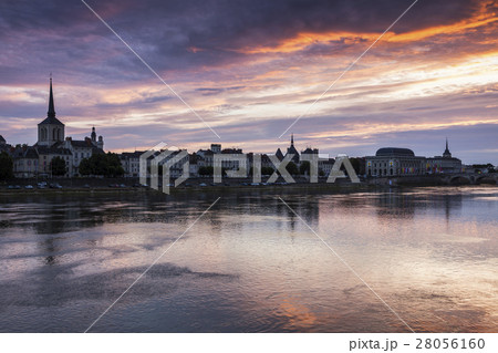 France, Pays de la Loire, Saumur, City waterfront at sunset 28056160