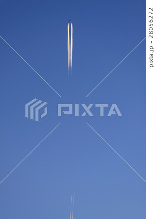 Low angle view of commercial airplane flying against blue sky 28056272