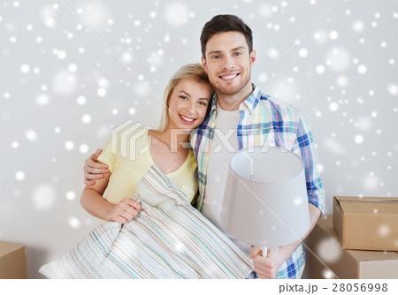 happy couple with stuff moving to new home happy couple with stuff moving to new home 28056998