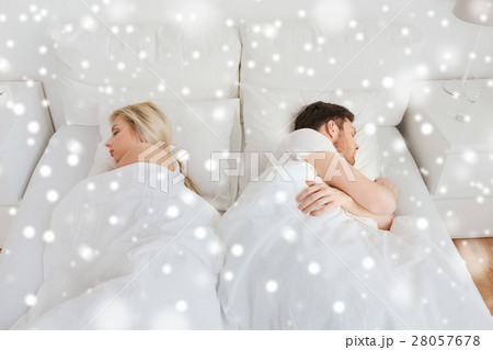 couple sleeping in bed at home couple sleeping in bed at home 28057678