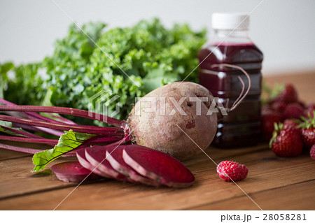 bottle with beetroot juice, fruits and vegetables 28058281