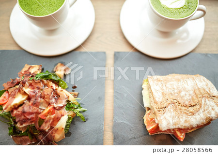 salad, sandwich and matcha green tea at restaurant 28058566