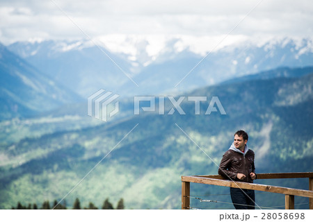traveler on top of watching a beautiful view traveler on top of watching a beautiful view 28058698