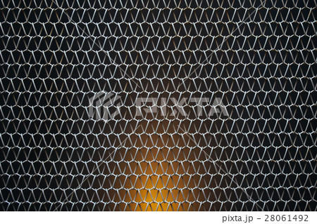 Metallic mesh grid net fence texture background Metallic mesh grid net fence texture background 28061492