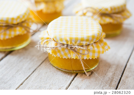 Orange marmalade on white table 28062320