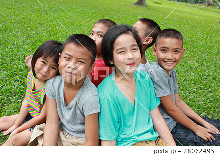 Six children playing in the park, spring time. 28062495